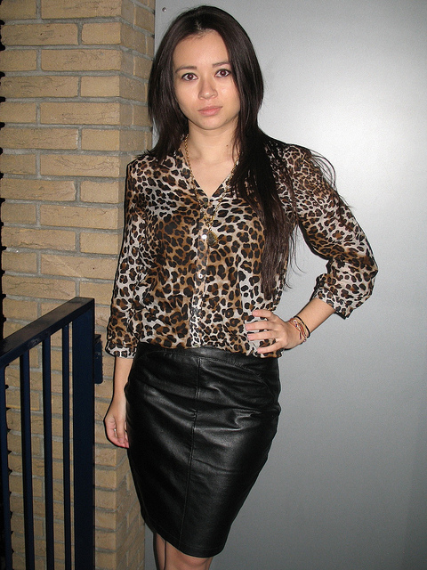 black leather skirt leopard print shirt